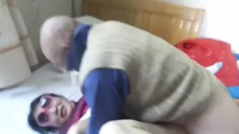 Chinese granny is having fun with grandpa
