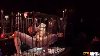 Chinese babe in cage eats and pisses in front of more dudes