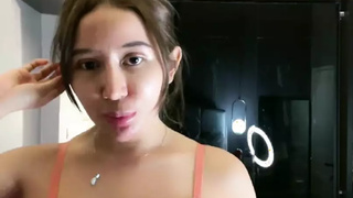 Camgirl plays with her boobs and exposing cameltoe perfect indonesian snatch