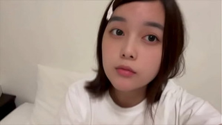 A perverted female college student masturbation with a vagina-swallowing toy while smelling her BF's smelly underwear after a bath.