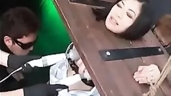 Horny Chinese Submissive Bound In Wooden Stocks And Dominated