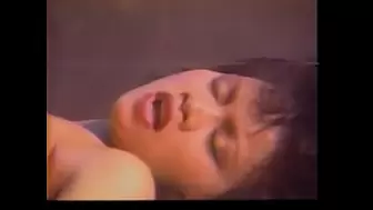 Thai whore and white MILF fuck with a toy in the sauna